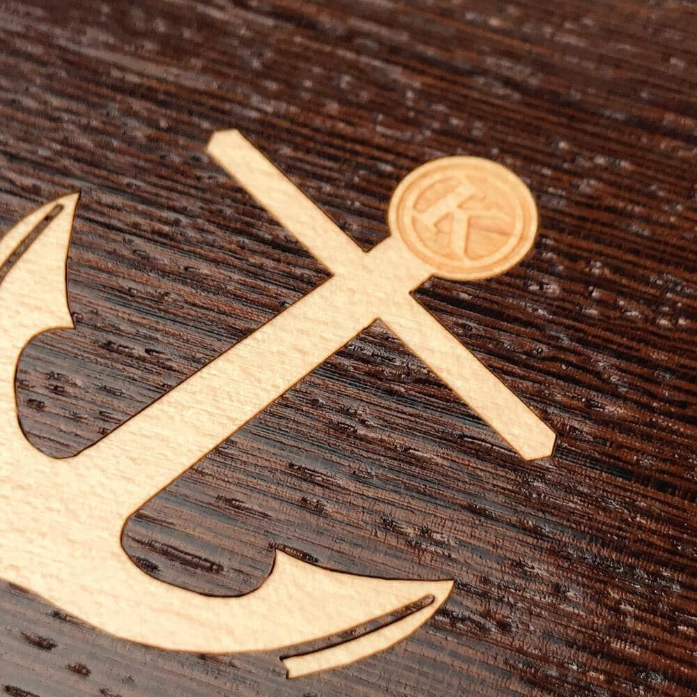 Zoomed in detailed shot of the Anchor Wenge Wood iPhone 16 Plus MagSafe Case by Keyway Designs