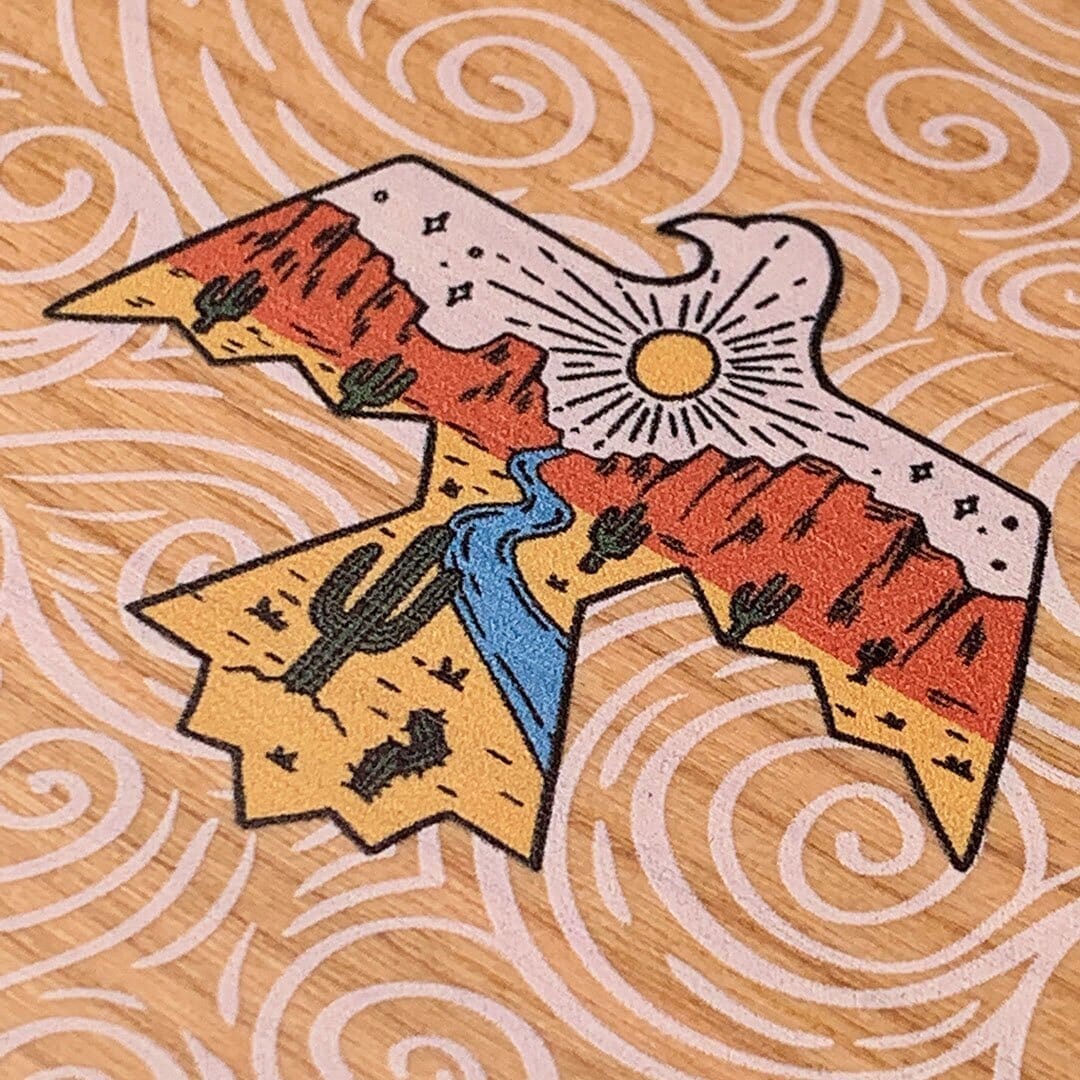 Zoomed in detailed shot of the double-exposure style eagle over flowing gusts of wind printed on Cherry wood iPhone 16 MagSafe Case by Keyway Designs