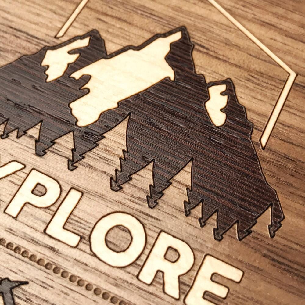 Zoomed in detailed shot of the Explore Mountain Range Wood iPhone 16 Plus MagSafe Case by Keyway Designs