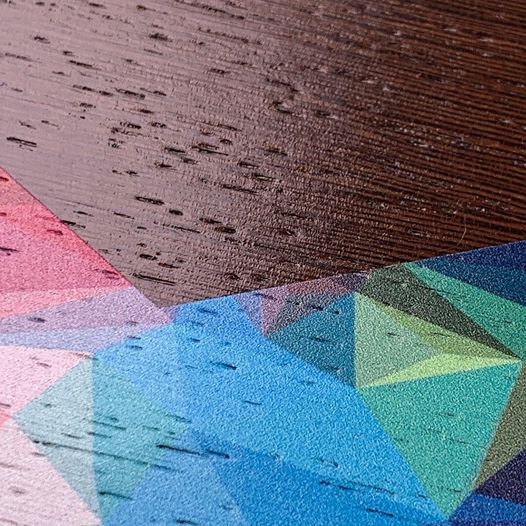 Zoomed in detailed shot of the vibrant Geometric Gradient printed Wenge Wood iPhone 16 MagSafe Case by Keyway Designs