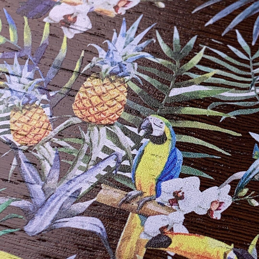 Zoomed in detailed shot of the Tropic Toucan and leaf printed Wenge Wood iPhone 16 Pro Max MagSafe Case by Keyway Designs