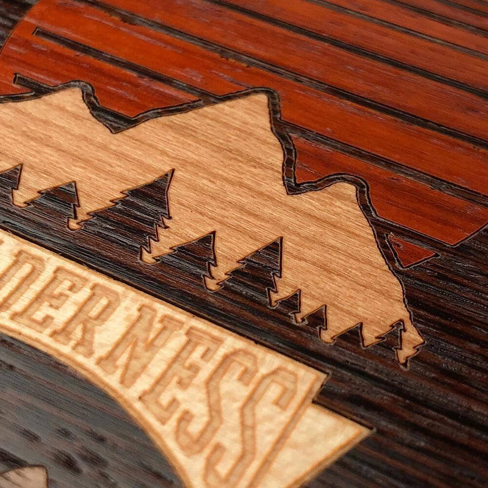 Zoomed in detailed shot of the Wilderness Wenge Wood iPhone 16 Pro MagSafe Case by Keyway Designs