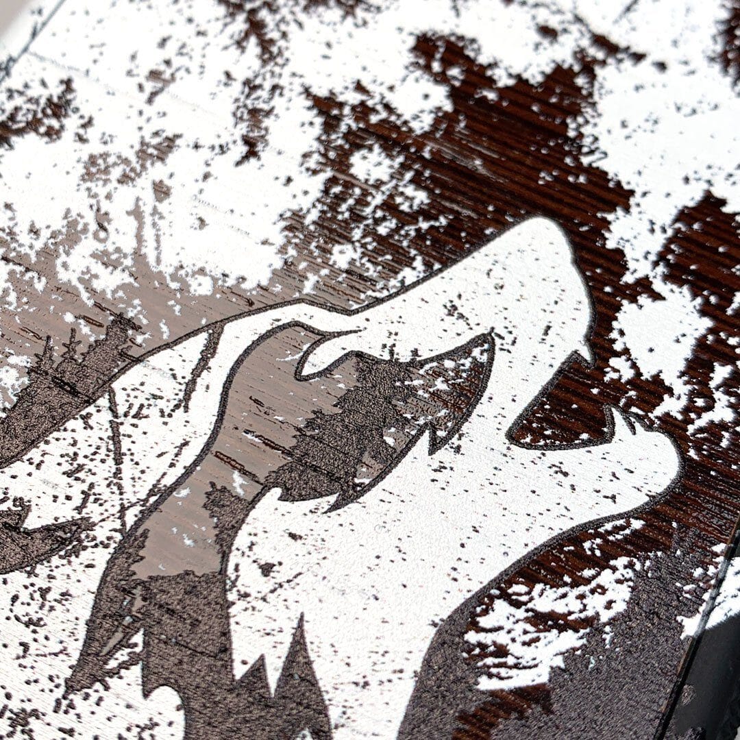 Zoomed in detailed shot of the high-contrast howling wolf on a full moon printed on a Wenge Wood Galaxy S25 Case by Keyway Designs