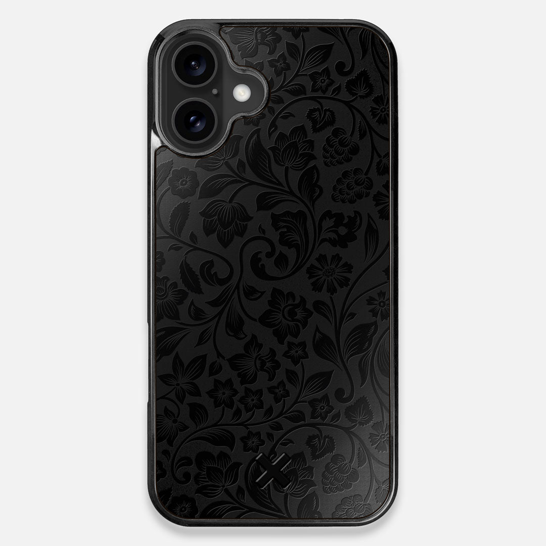 Front view of the highly detailed midnight floral engraving on matte black impact acrylic iPhone 16 Plus MagSafe Case by Keyway Designs