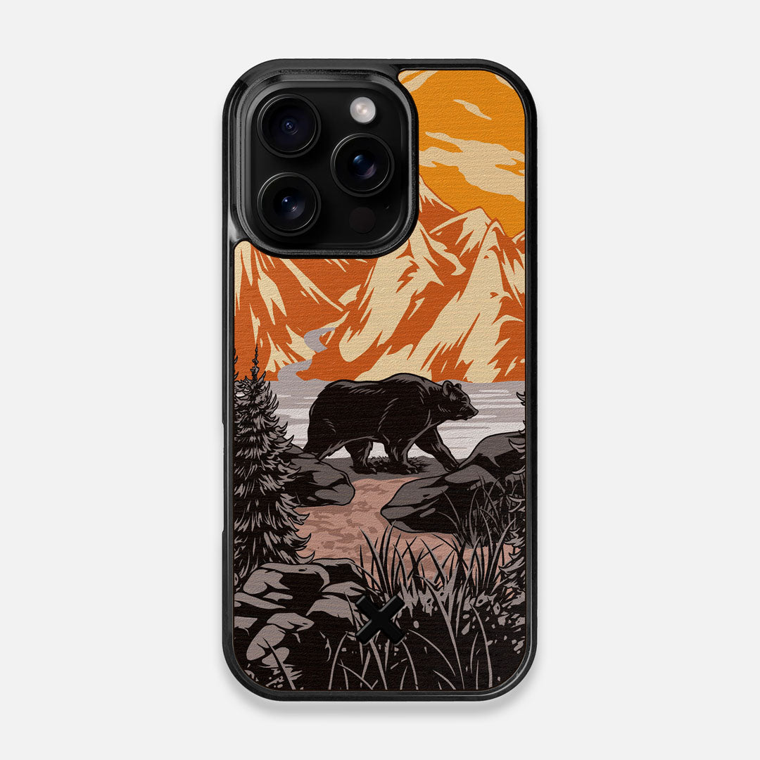 Front view of the stylized Kodiak bear in the mountains print on Wenge wood iPhone 16 Pro MagSafe Case by Keyway Designs