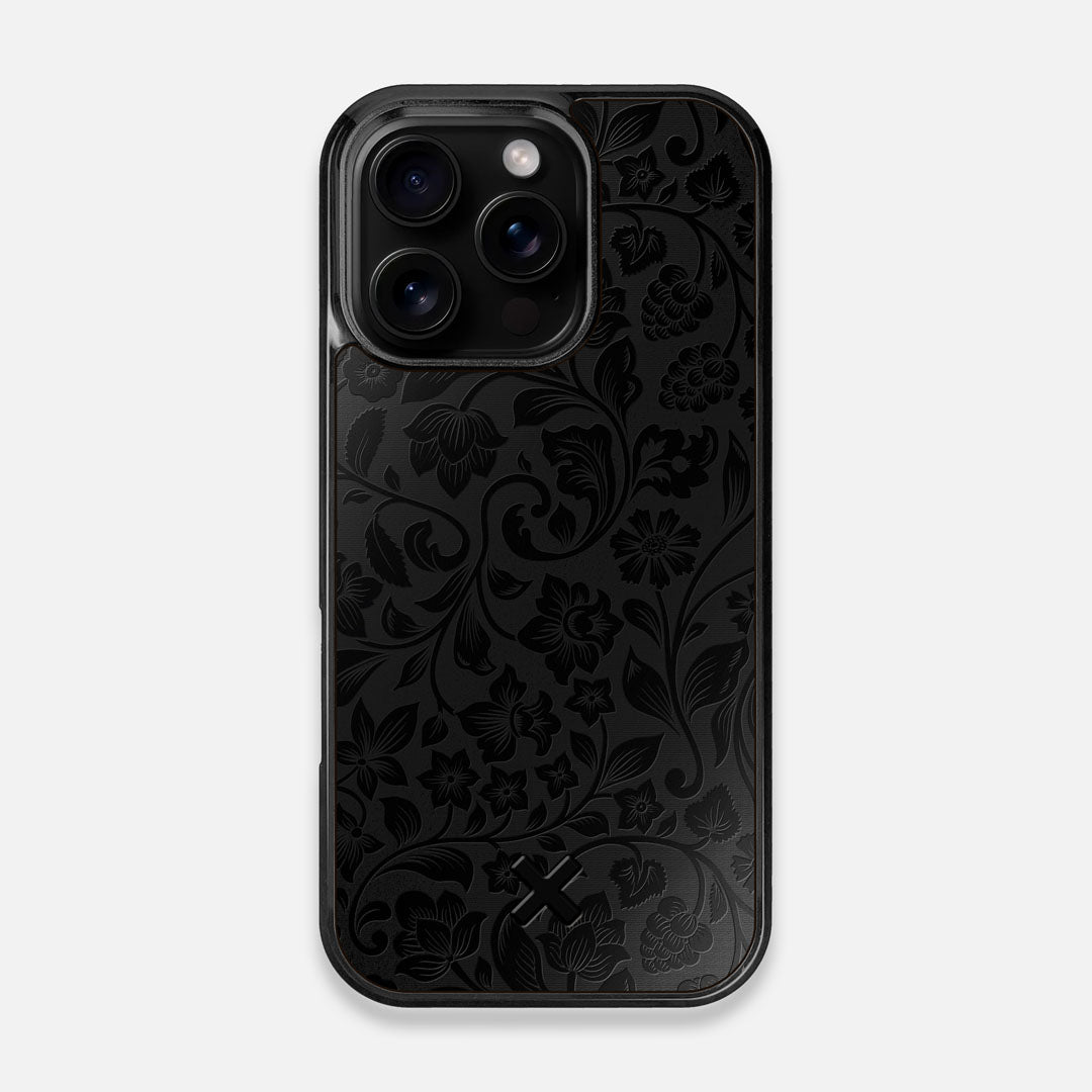 Front view of the highly detailed midnight floral engraving on matte black impact acrylic iPhone 16 Pro MagSafe Case by Keyway Designs